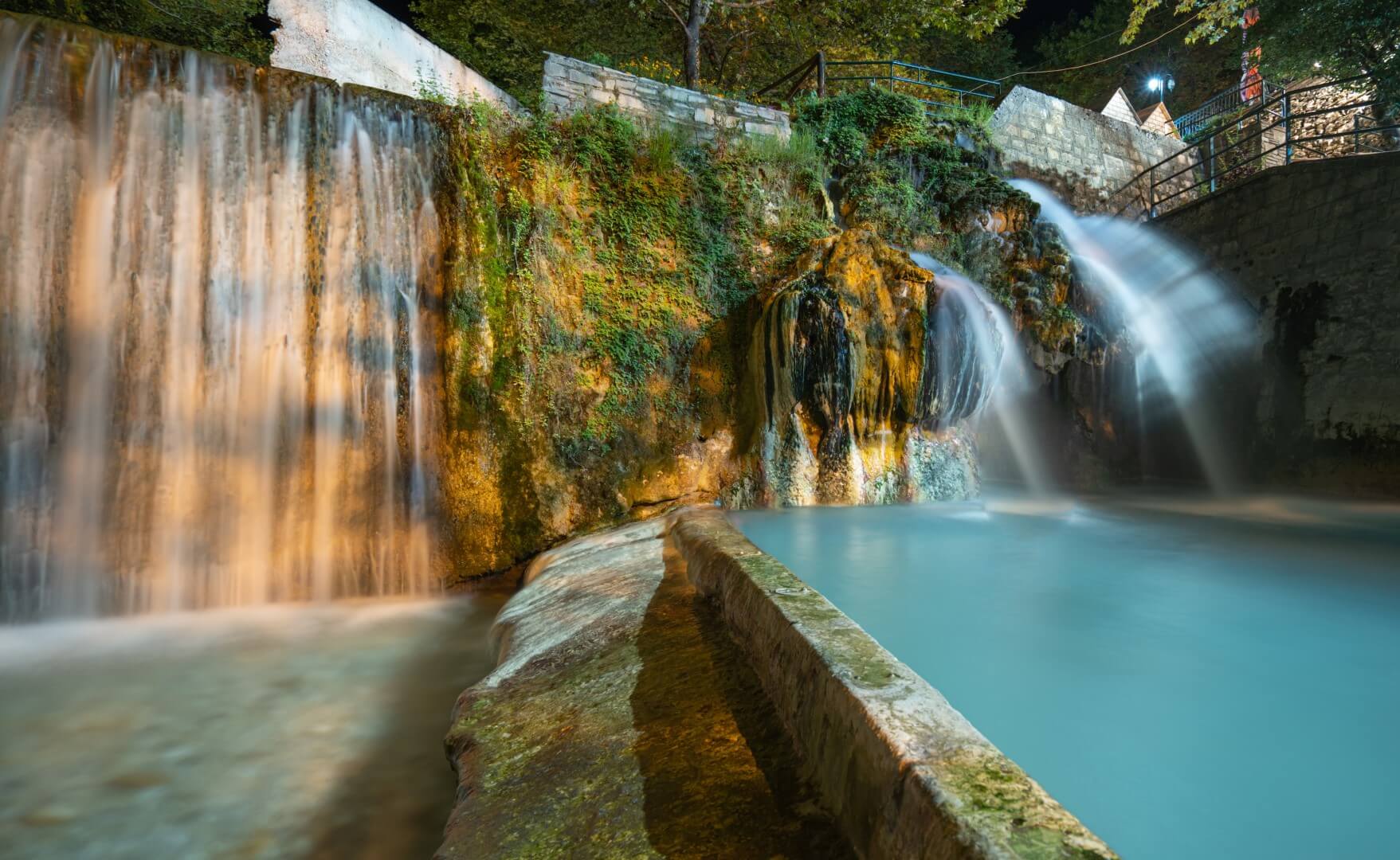 Thermal waterfalls and natural pools at Pozar Hot Springs in Northern Greece during winter