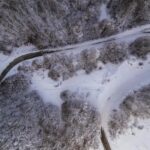 Snowy mountain road in Kastoria during winter in Greece travel