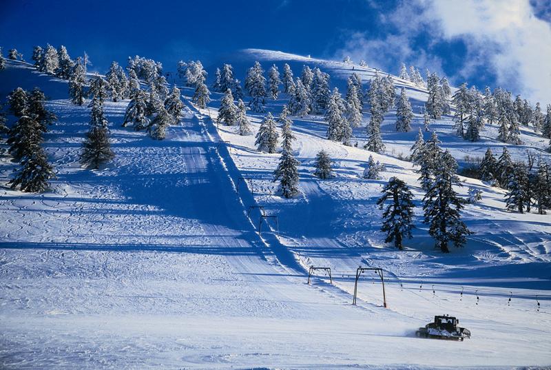 Snowy slopes and ski lifts at Vasilitsa Ski Resort in Grevena, Northern Greece